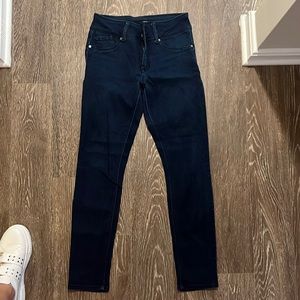 Mid-rise dark wash skinny jeans